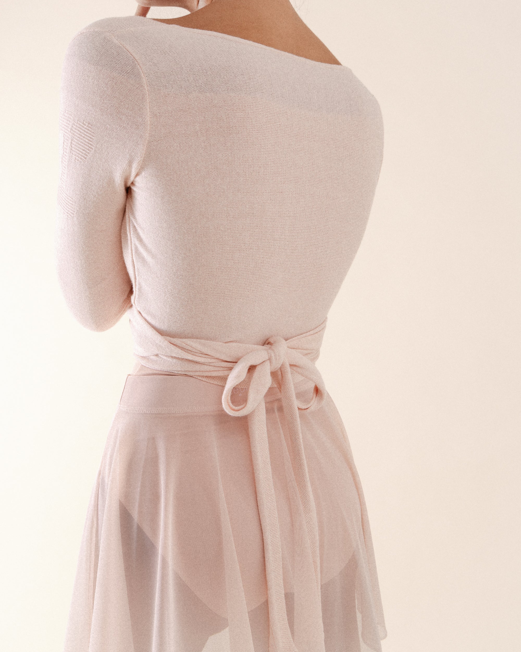 Long sleeved wrap-over